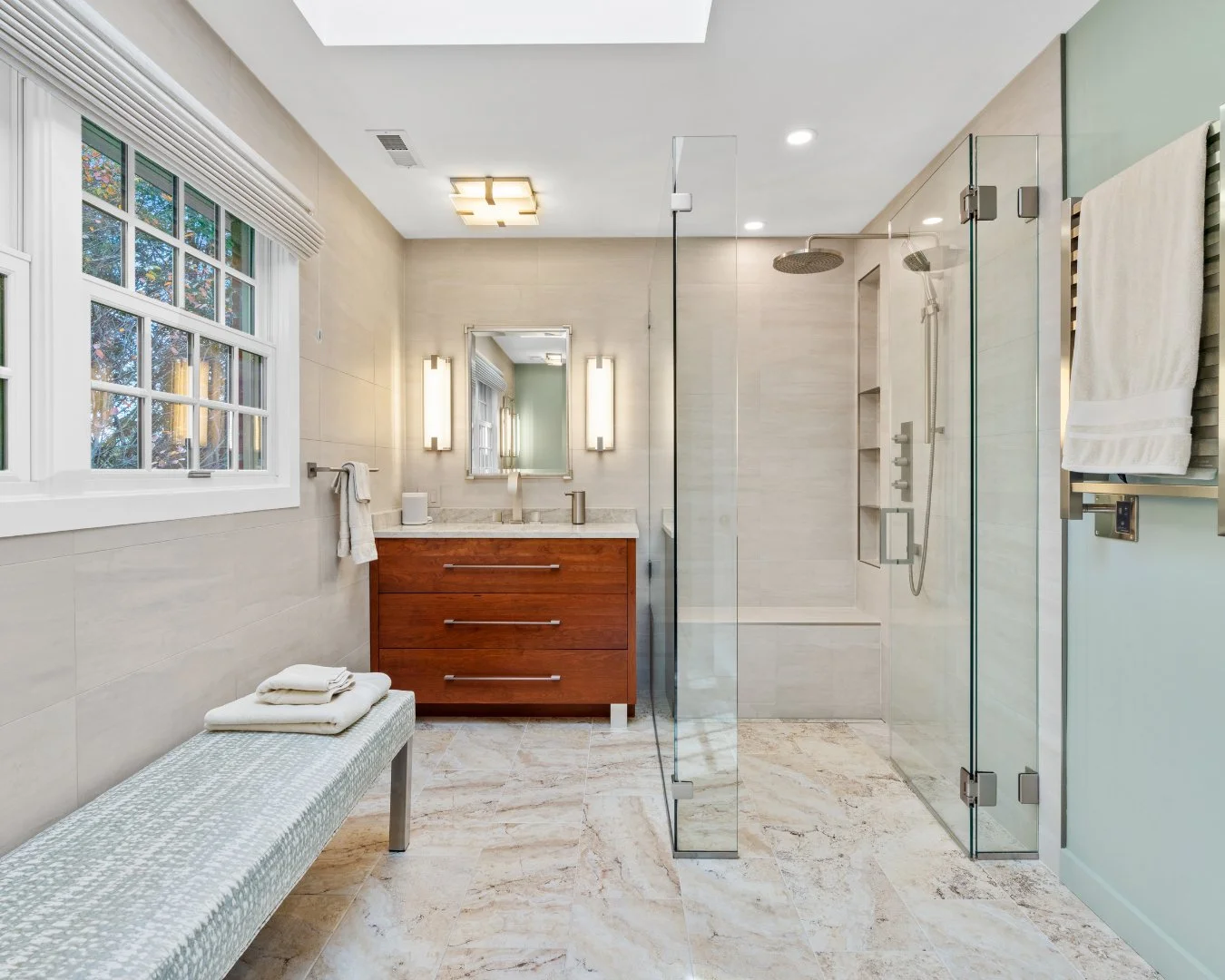 What would it take to fall in love with your bathroom?⁠
⁠
For this homeowner, it started with a zero-threshold walk-in shower, heated floors, and a towel warmer with adjustable temperature settings. Our team handled the structural work, including ope