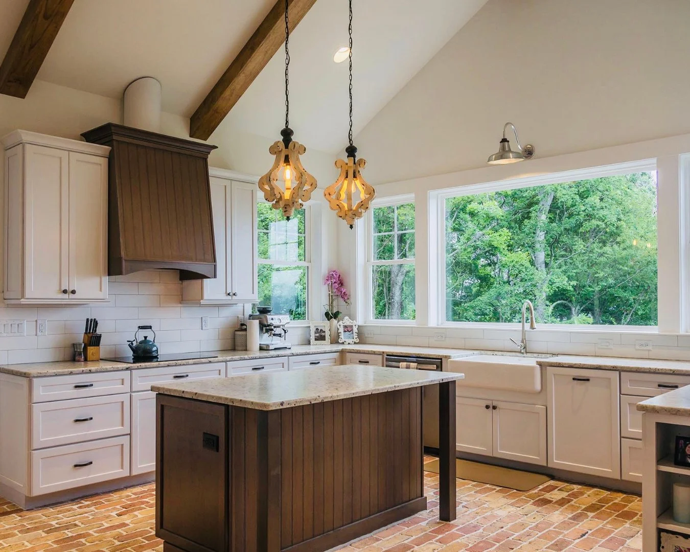 This house is all about the views, and it's easy to see why.⁠
⁠
Tucked away on 10 wooded acres, this custom home sits at the end of a long driveway that opens up to sweeping layers of mountain ranges. Large windows at the front and back frame those v