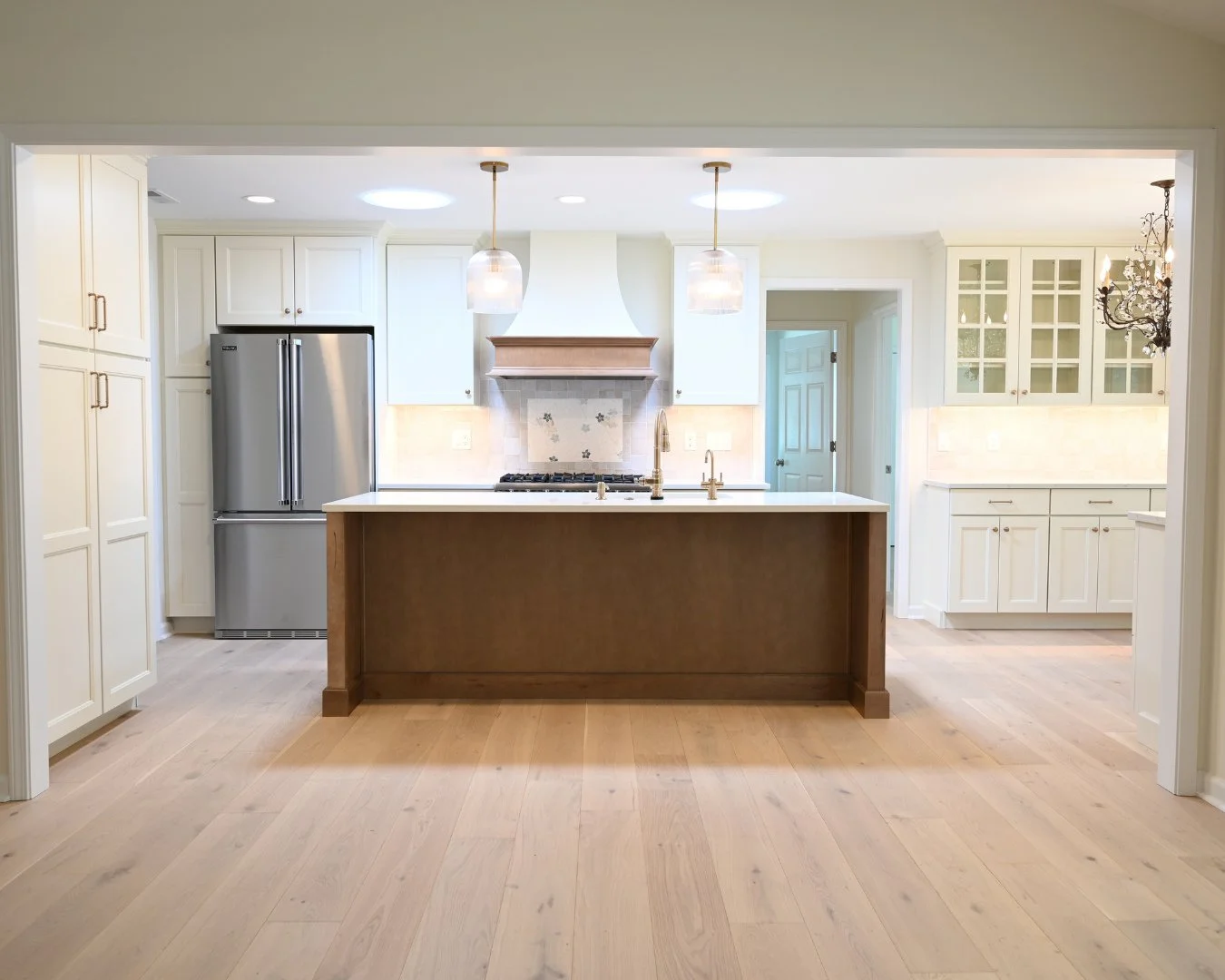 Swipe to see where this kitchen started. 👉⁠
⁠
This whole-house remodel in Weaverville included a complete kitchen overhaul, with our team opening up the space to create the open-concept layout you see here. We worked closely with @homesource_design_