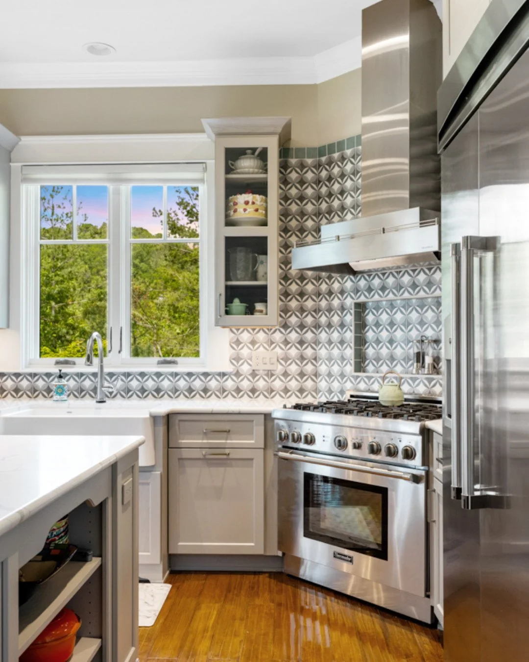 Same footprint, but completely different kitchen. Swipe to see the before. 👉⁠
⁠
This Asheville kitchen renovation kept the existing floor plan and updated everything else. Our team reconfigured the cabinetry height and built custom storage into the 