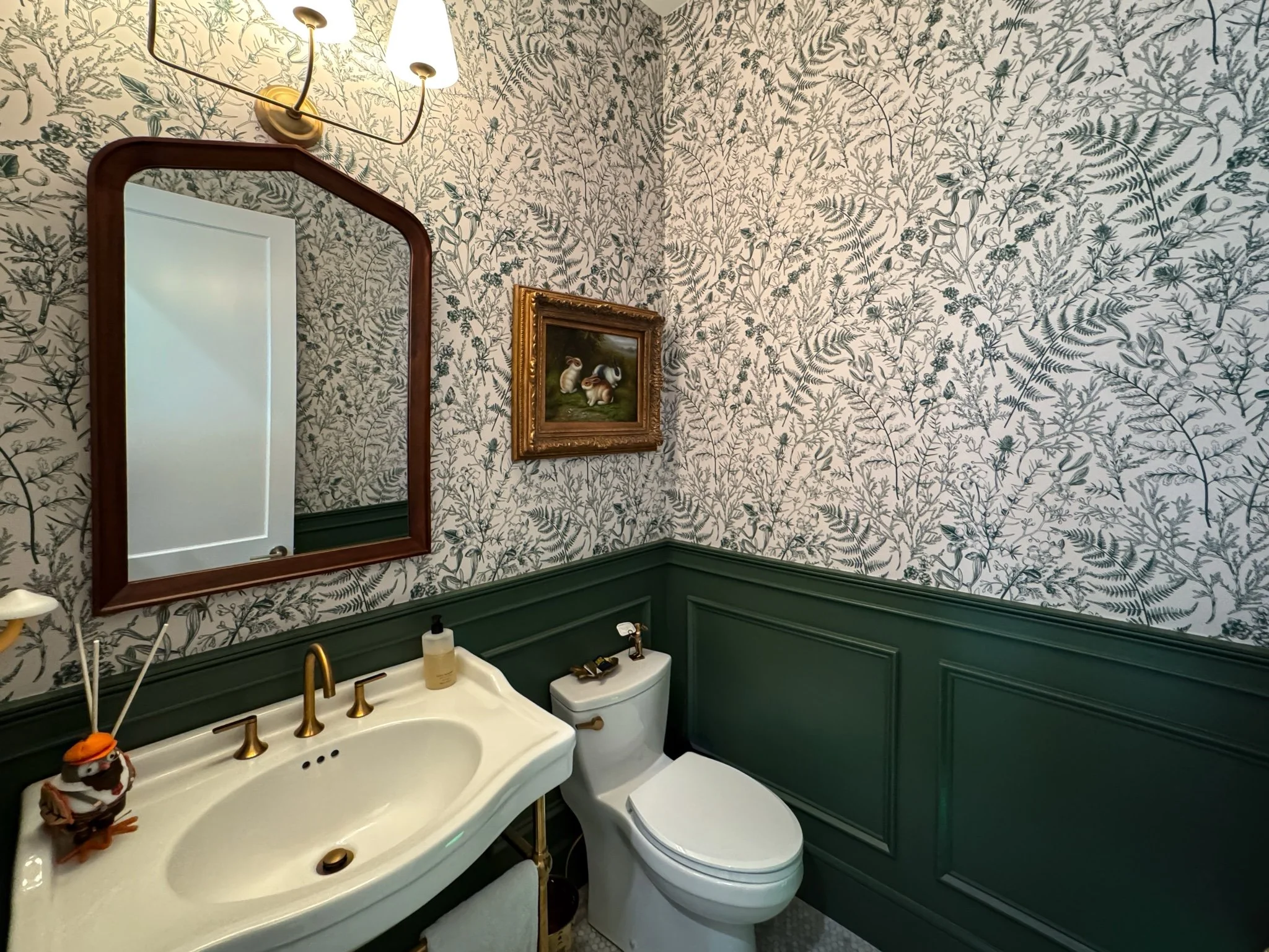homesource-custom-home-powder-bath-botanical-wallpaper-green-wainscoting.jpg