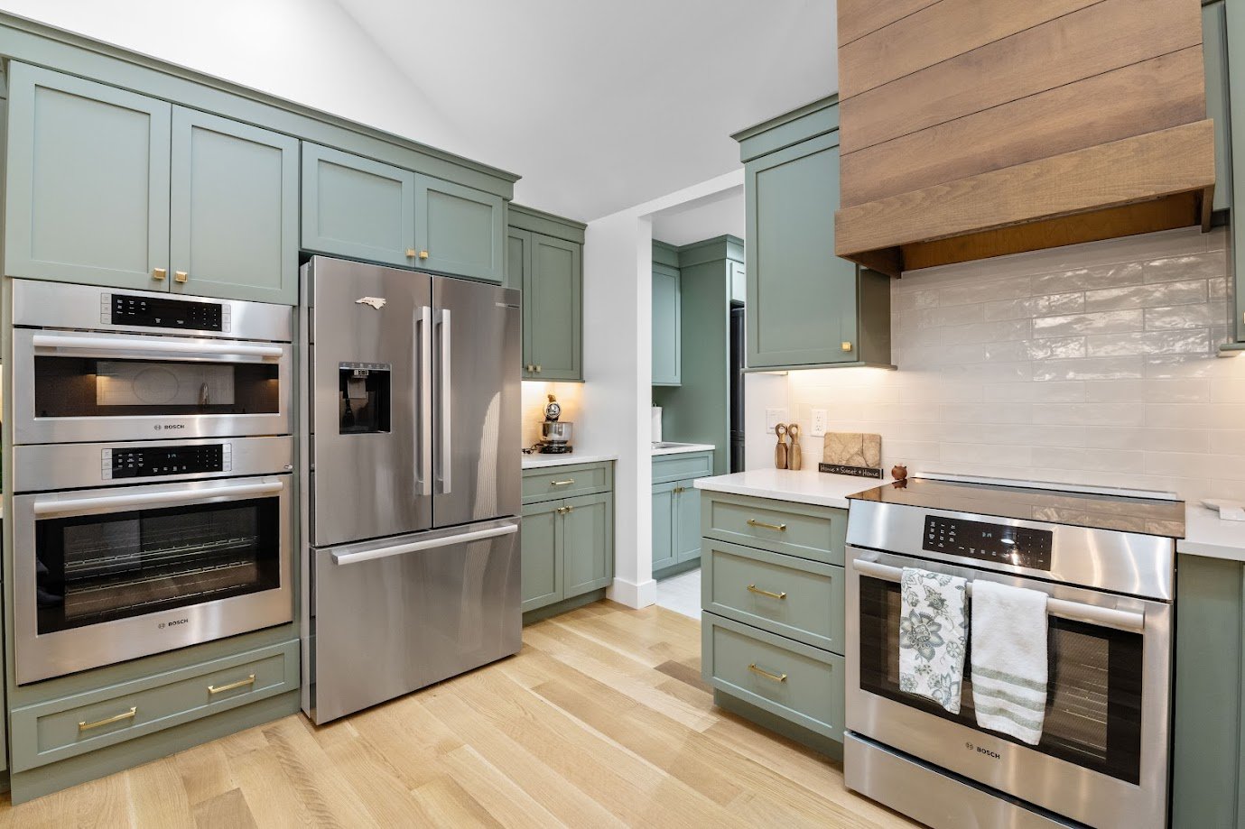 asheville-kitchen-remodel-bosch-double-oven-starmark-sage-green-cabinets.jpg