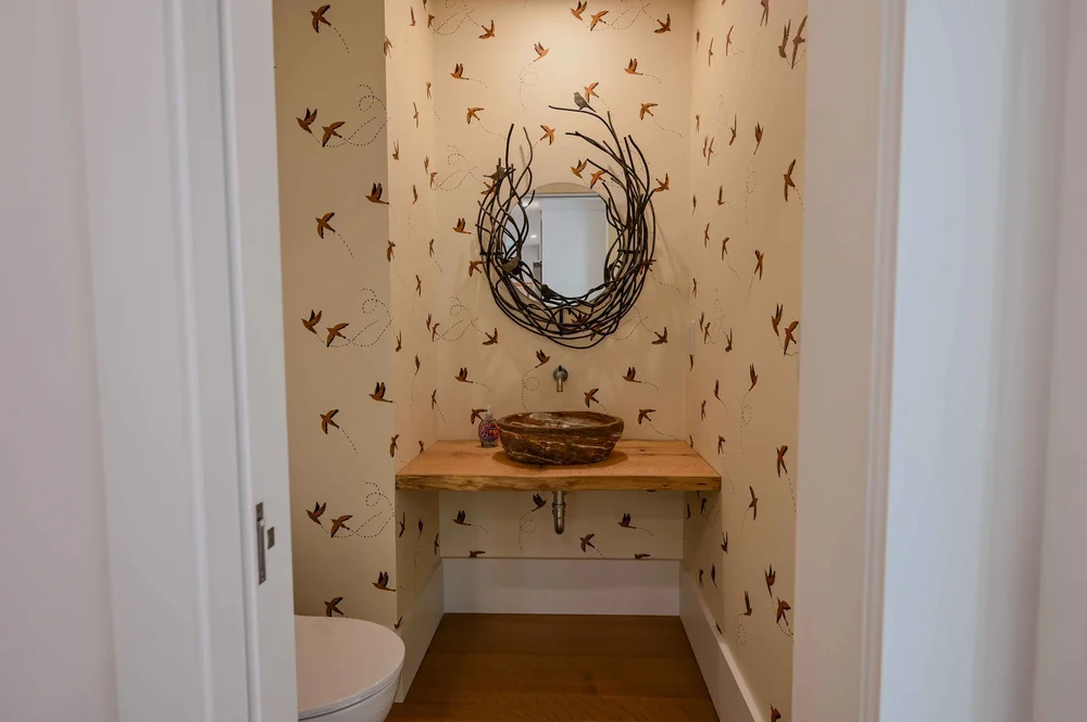 Asheville Country Club-custom-powder-room-floating-vanity-bird-wallpaper.jpg