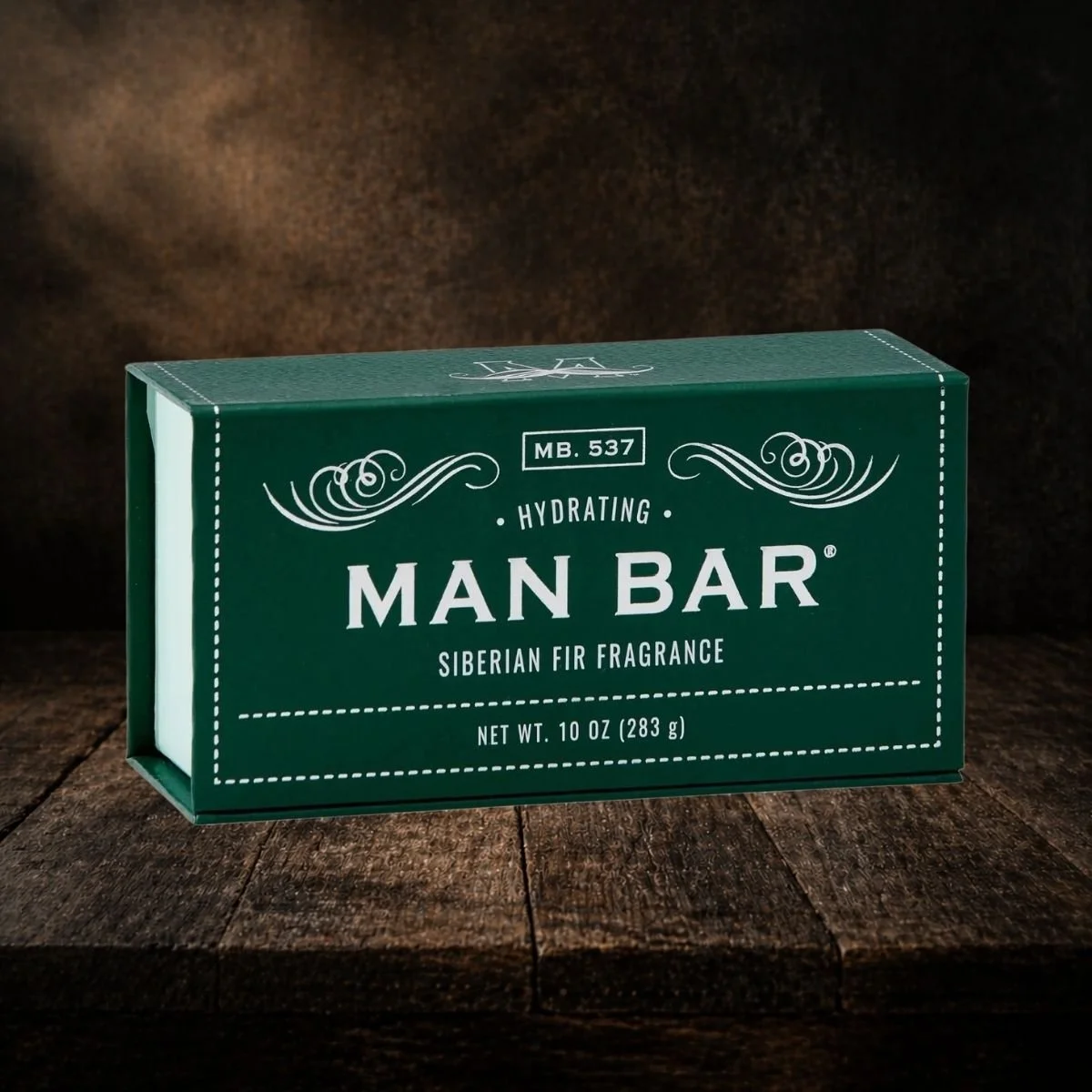 Man Bar Soap MB.537 Hydrating Siberian Fir 10oz bar in forest green leather-textured gift box with white lettering, on a white background
