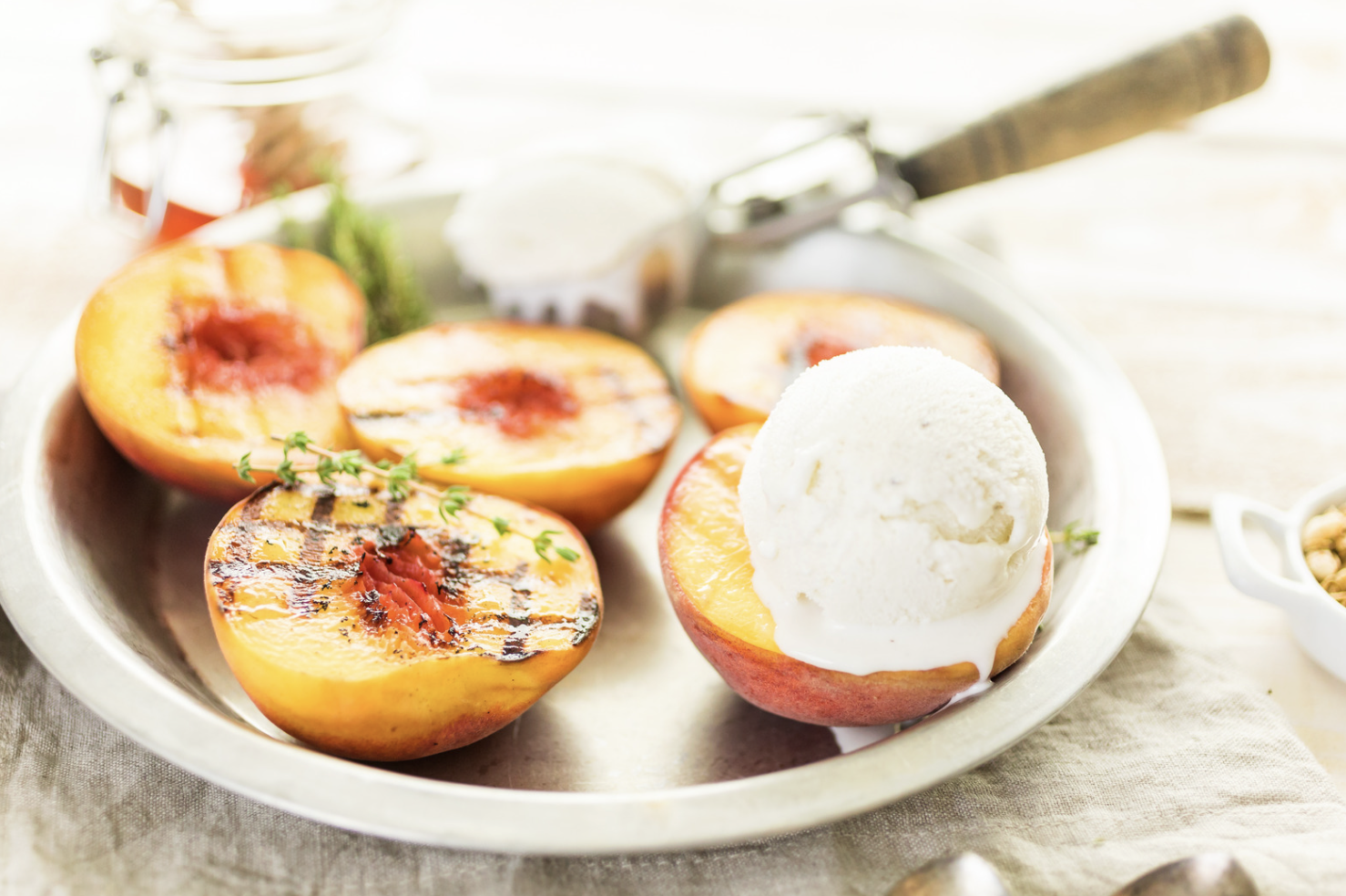 Grilled balsamic peaches — caramelized grilled peach halves with vanilla ice cream, The Tea Tree
