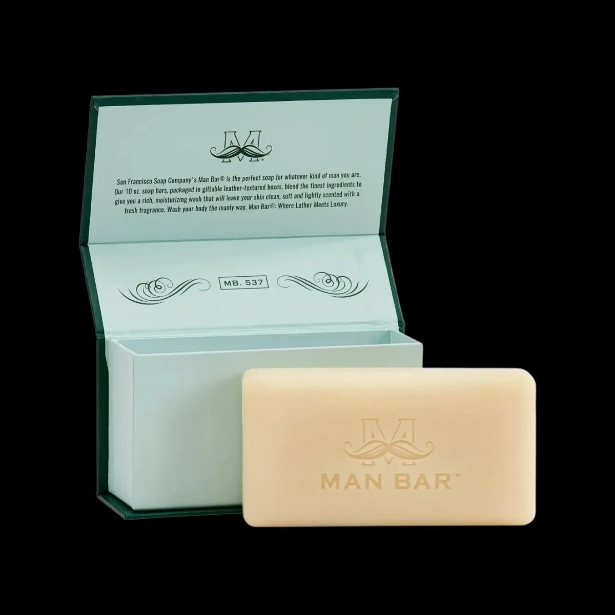 Man Bar Soap MB.537 Hydrating Siberian Fir 10oz bar removed from open forest green leather-textured gift box with mint green interior, showing embossed Man Bar logo on cream-colored soap