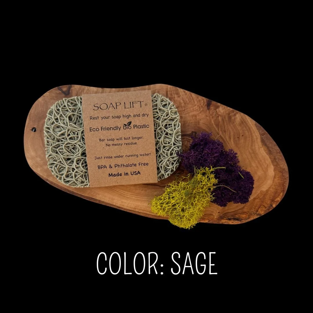 Sage Soap Lift eco-friendly bio plastic soap dish on a dark rustic wood surface