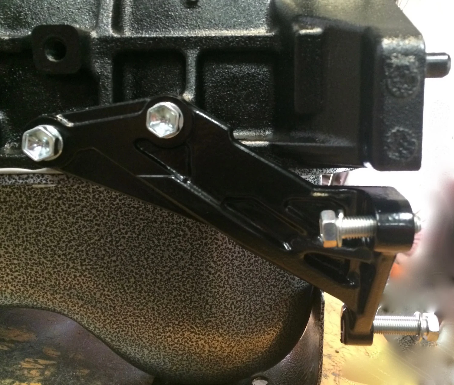 block to transmission brace bolts — 22RE Performance