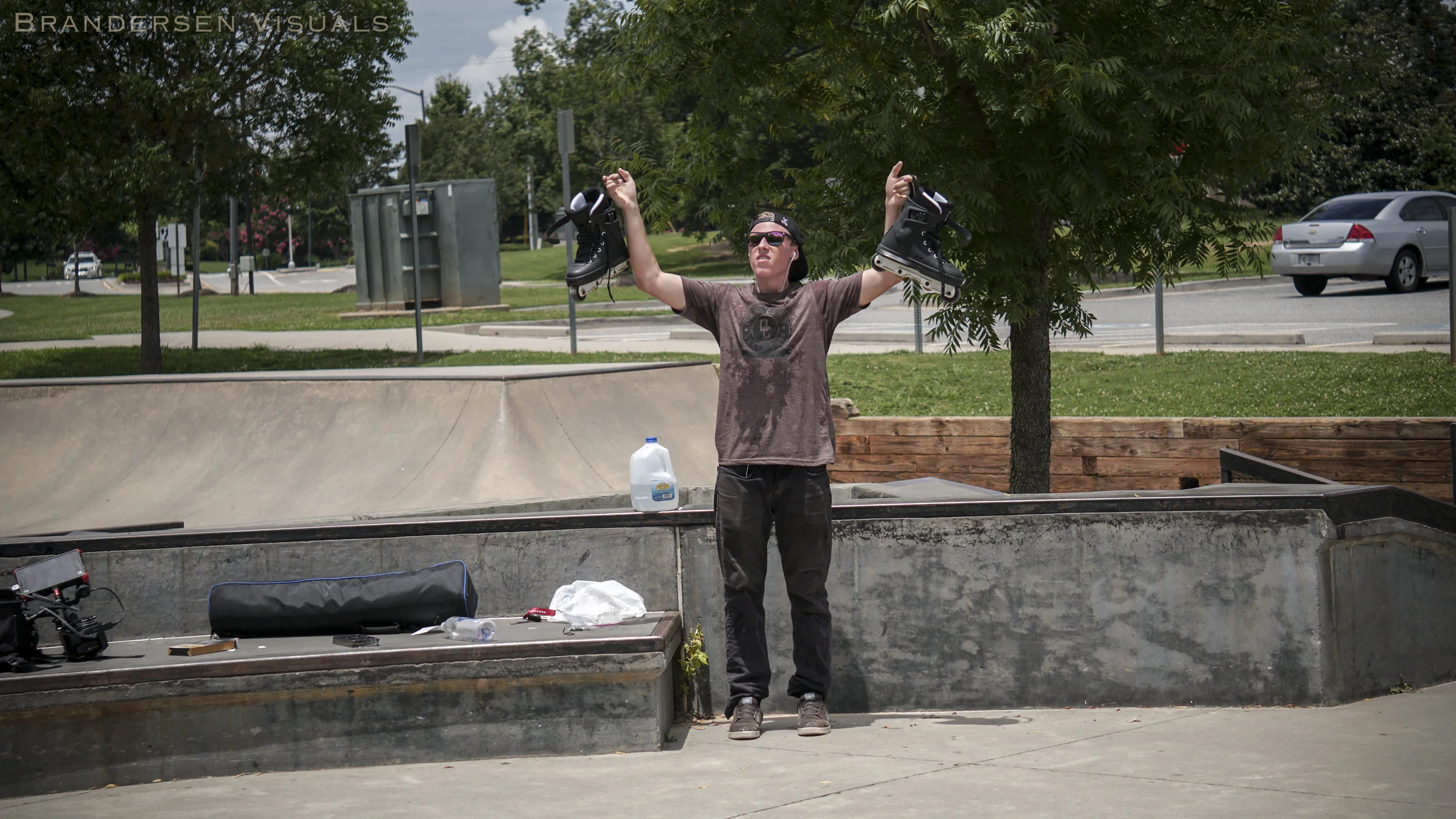 Patrick_Holding Skates Up.jpg