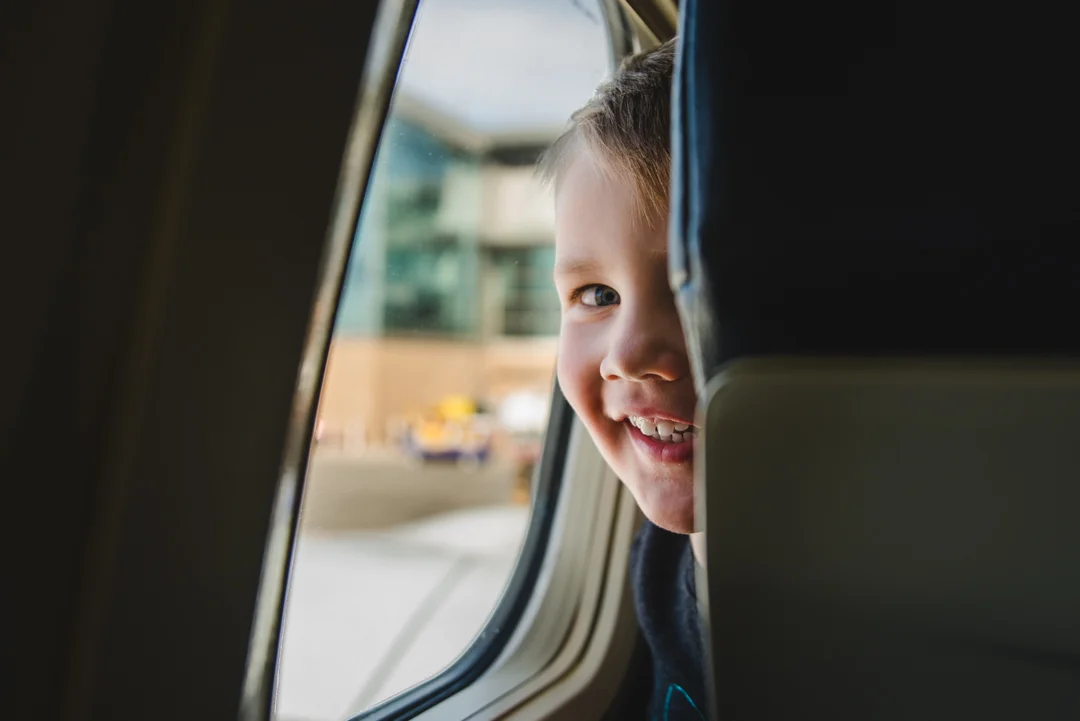 That's the smile of a kid on his way to Disney World.