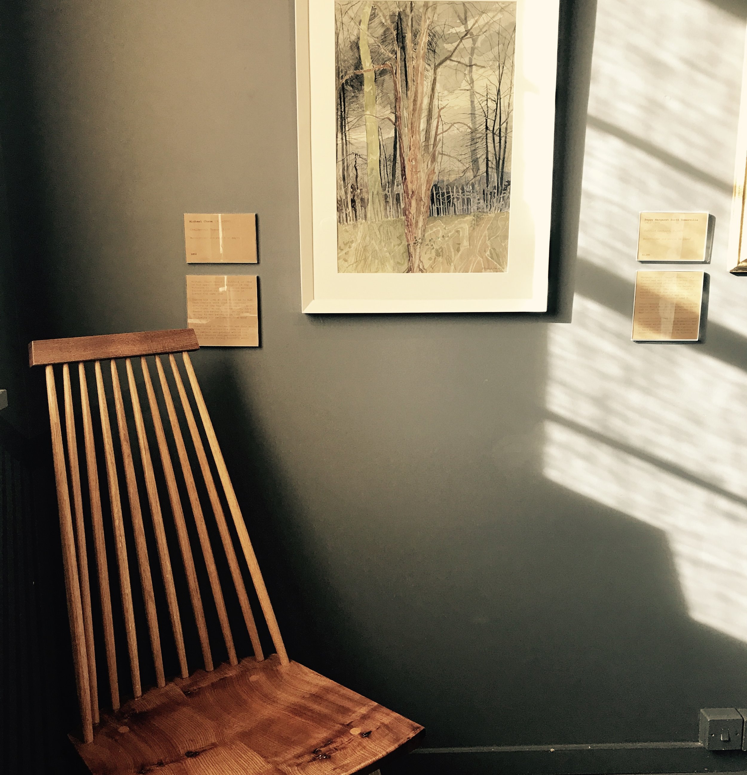 Comb-back Chair, 2017 by Among Trees Design. &nbsp;English Elm and French oak. £950.00Shown with Chelsworth Trees, 1977, by Michael Chase (1915-2001). Watercolour and pencil on paper.£850.00