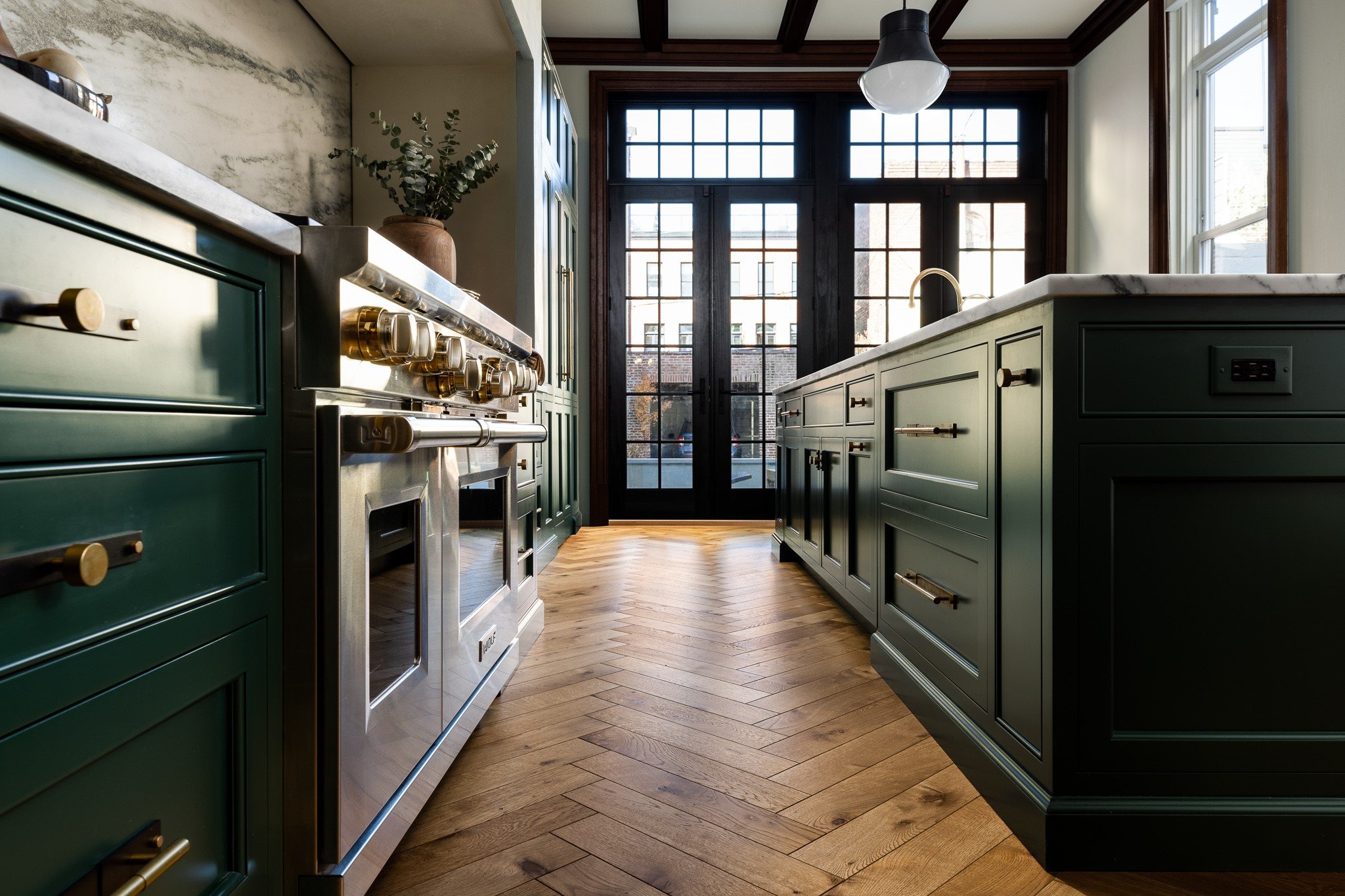 Custom kitchen cabinets with herringbone floors