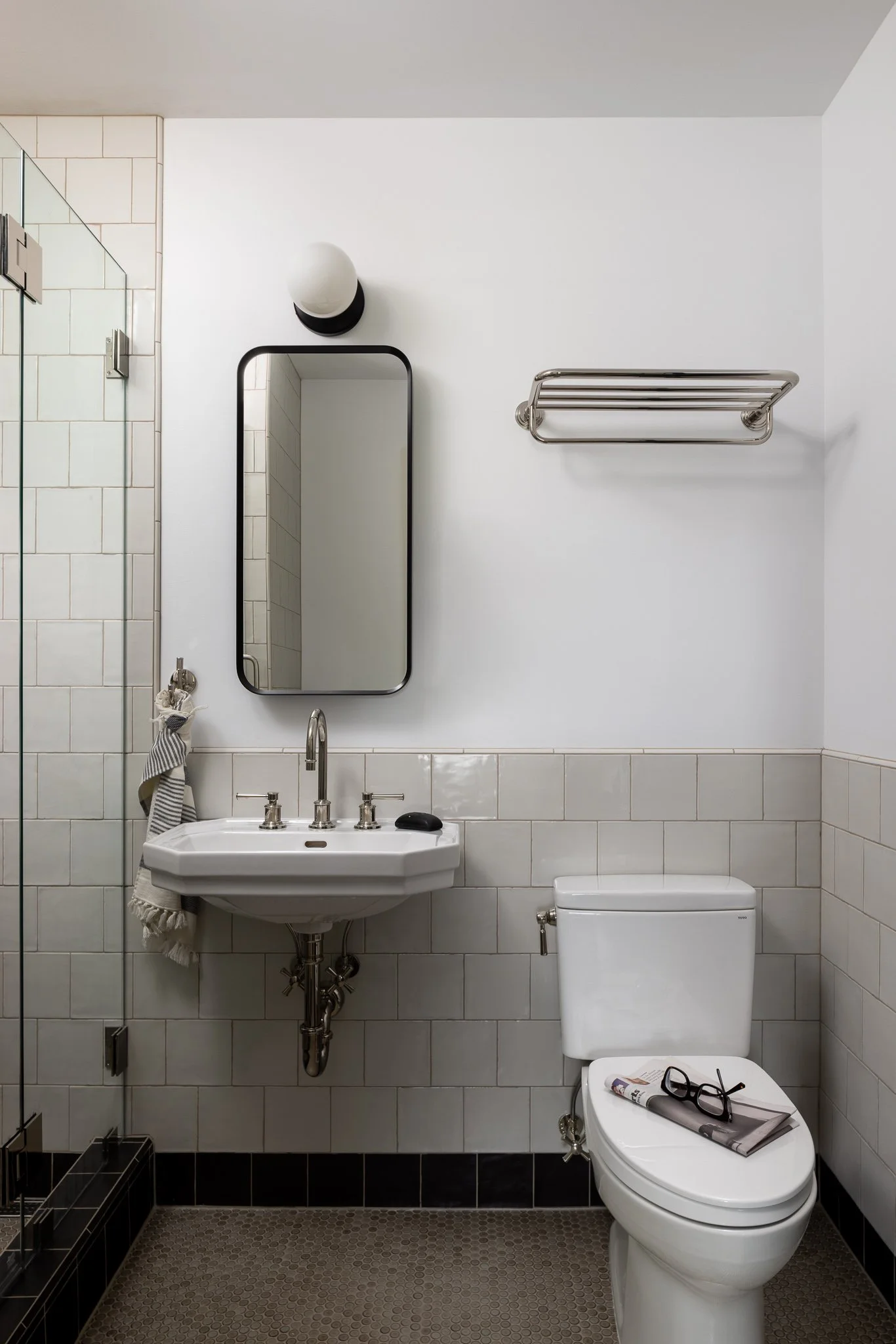 vintage bathroom wall mounted sink with subway tile and mirror philadelphia interior design