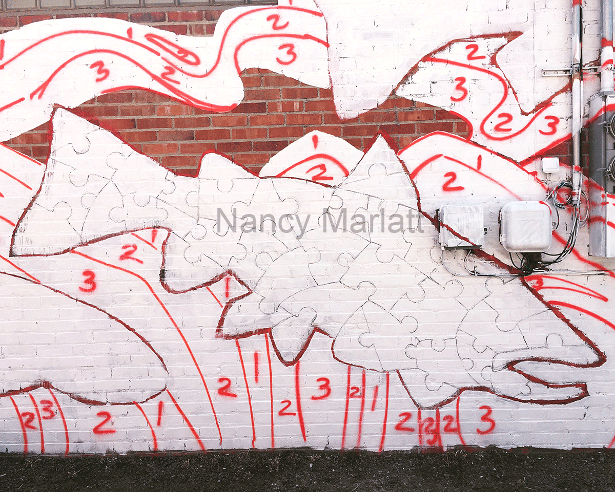 Puzzle fish outlines, primed, and ready to paint. Those cable boxes to the right were a lesson to paint.
