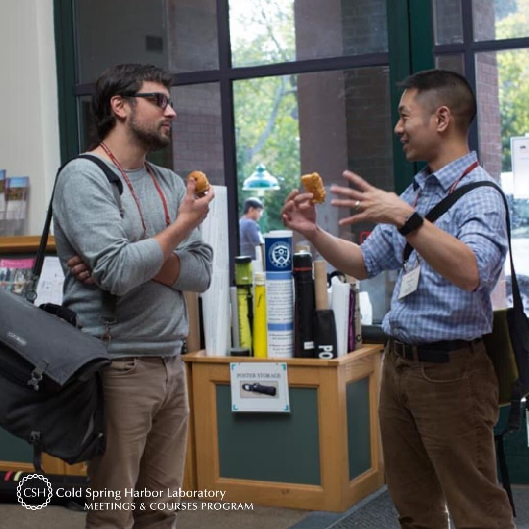 We're hosting Genome Informatics this week and so we took a look at its photo gallery and this moment, taken during the 2017 meeting, caught our attention. This type of interaction is quite common at our in-person meetings: Two (or more) participants