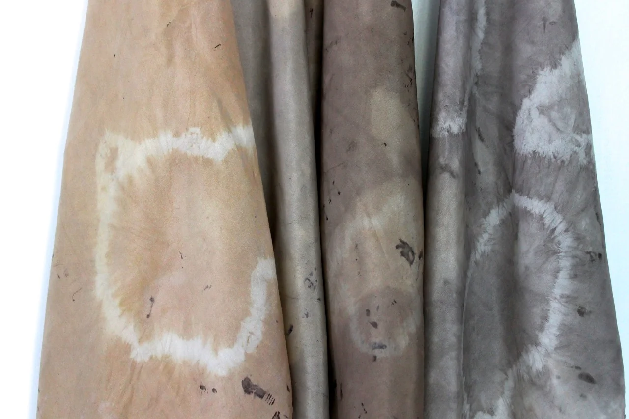 Caldera scarves Silk with hand-rolled hems Dyed with rusty reclaimed objects and simple shibori techniques Shades of chesnut & chesnut + iron baths — Ruptures of light in dark times… The word shibori comes from the verb root shiboru, “to wring, squeeze, press.” It emphasizes the importance of action performed on cloth beyond it’s two-dimensional quality.