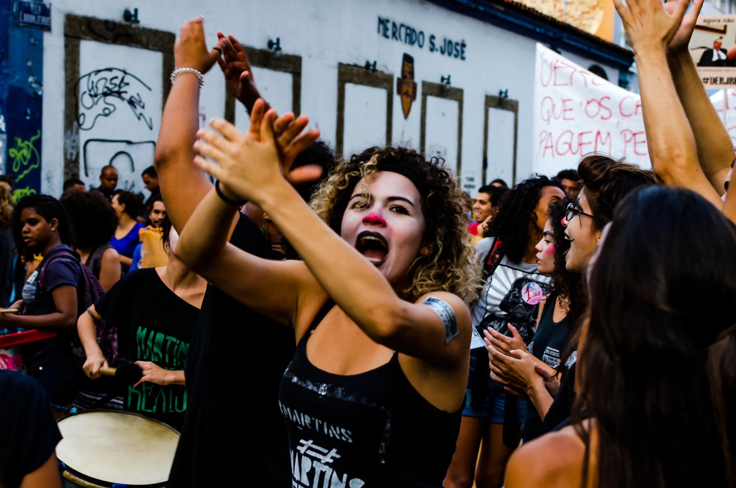 Protesters from a Rio De Janeiro arts school sing and dance during a demonstration aimed at voicing concerns over the lack of funding that has plagued the post-secondary education system since the recession has started.