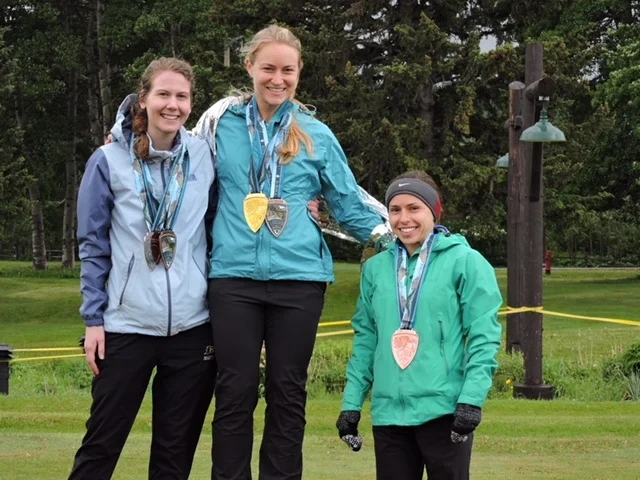 Laura Kromann on the podium in Glacier National Park
