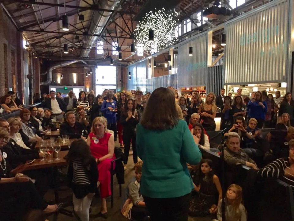 Congresswoman Diana DeGette speaking to Blue Rising Supporters in Denver.