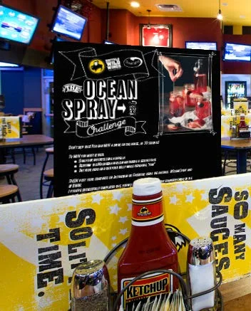 Win a free drink on the hous... in 30 seconds! To win you must either: - Sing your favorite song a capella - Perform the macarena while maintaining a serious face. - Then post your craziness on Instagram or Facebook using the hashtags, #oceanspray and #bww to win a free drink.
