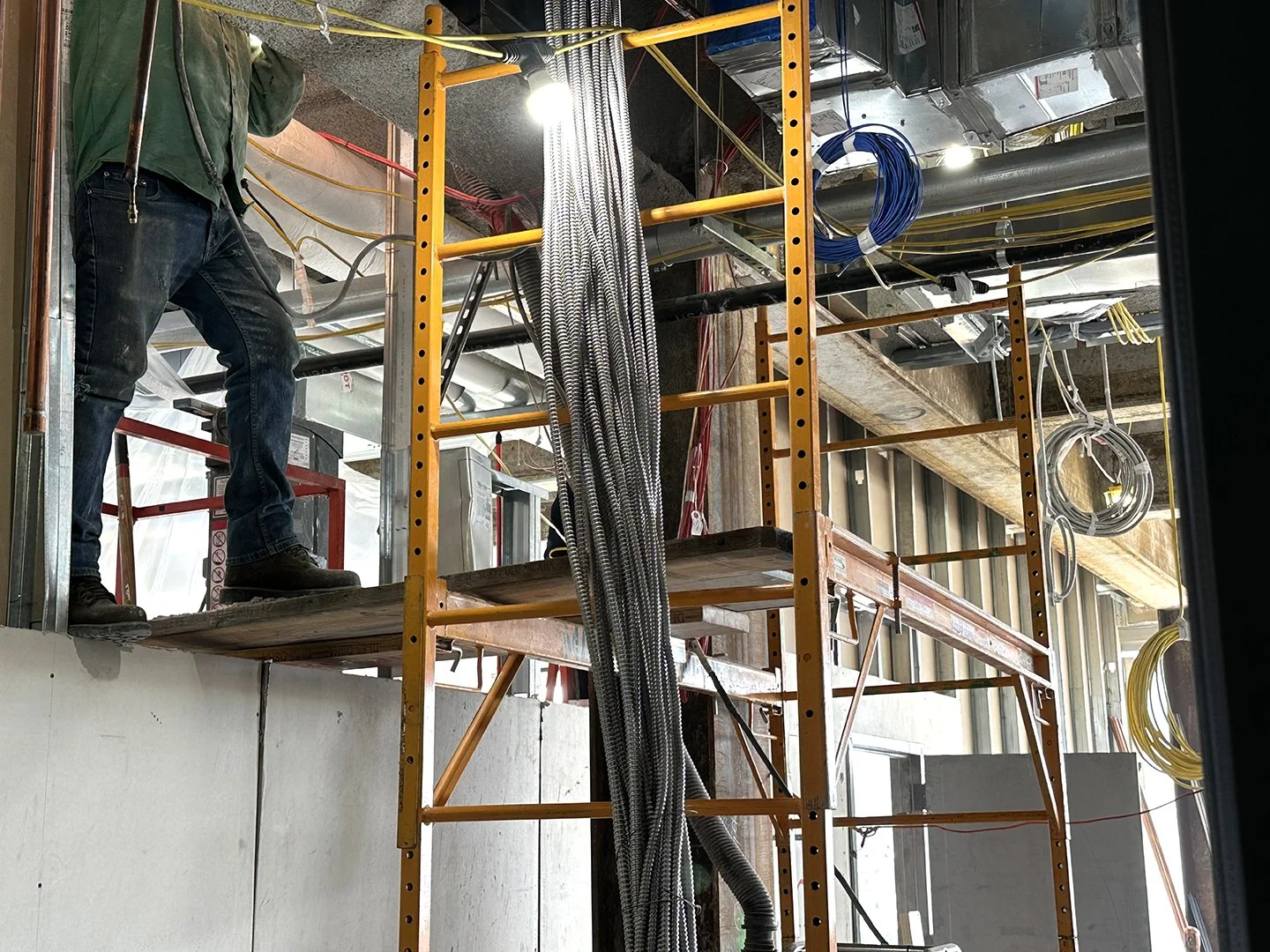 Man on Scaffold Web.jpg