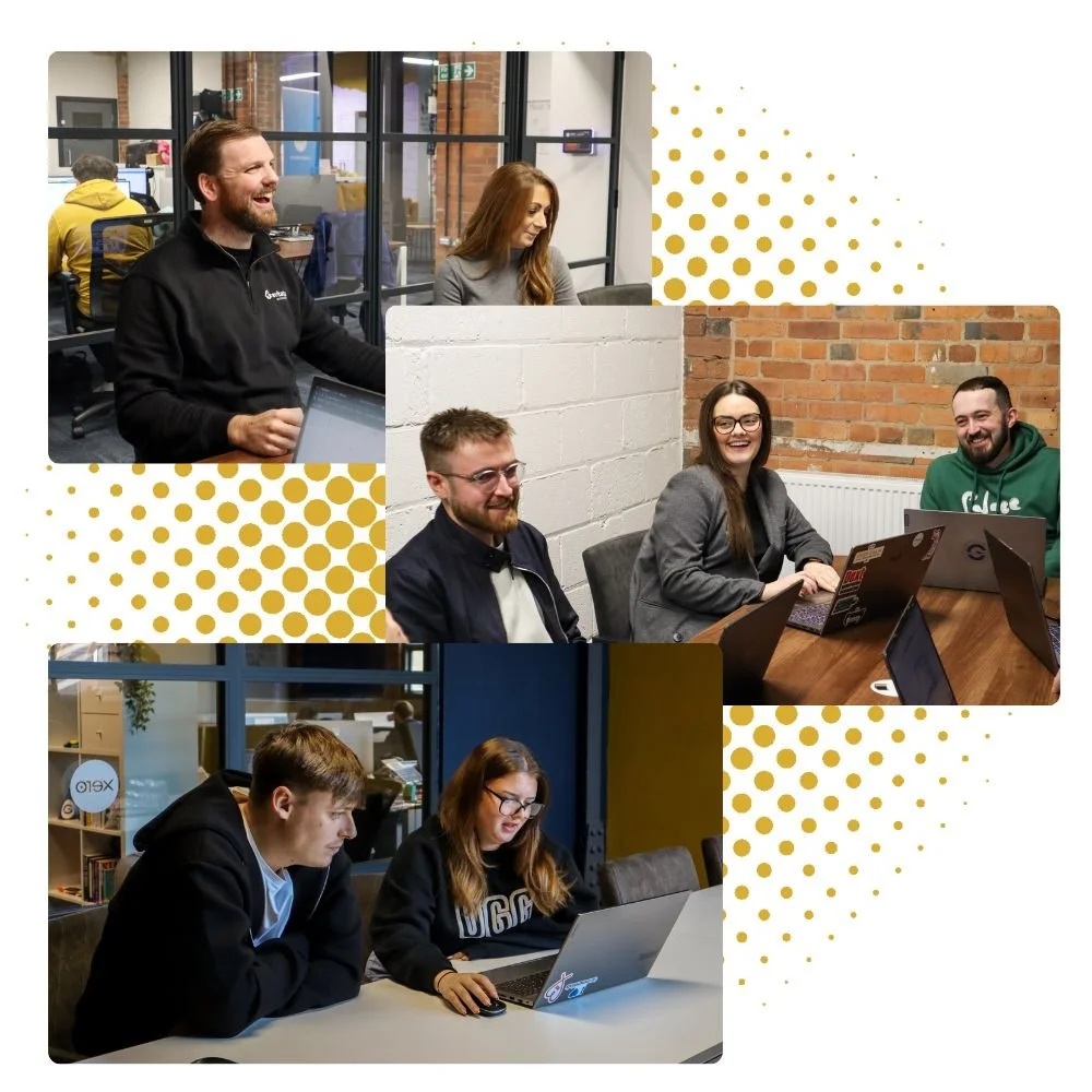 Group of six people in a modern office space, some working on laptops, others engaged in conversations, with a mix of sitting and standing arrangements.