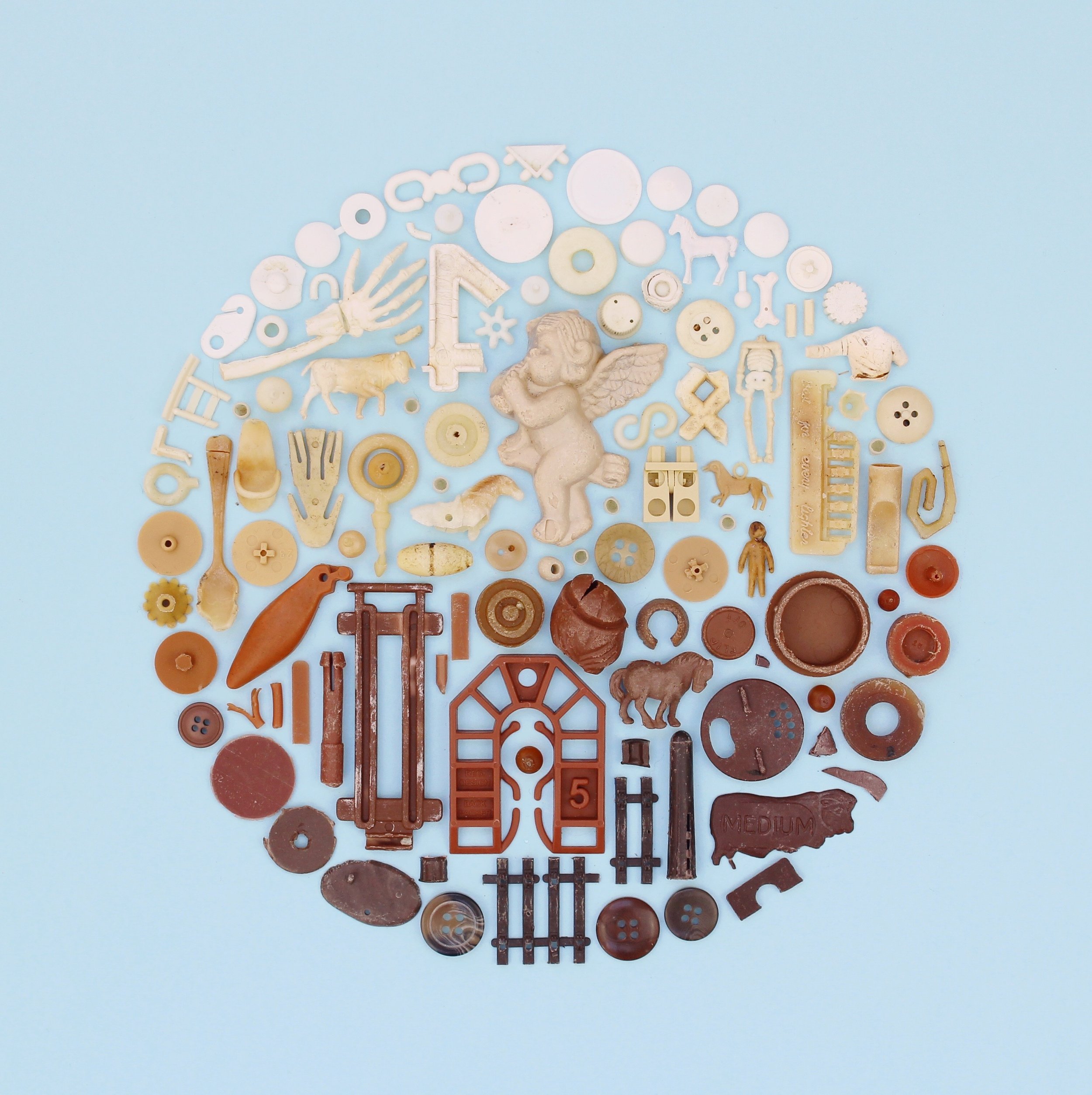  White, cream and brown beach plastic 