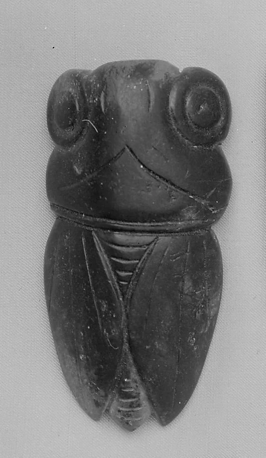 Jade Amulet, Han Dynasty Image courtesy of the Metroploitan Museum, New York)