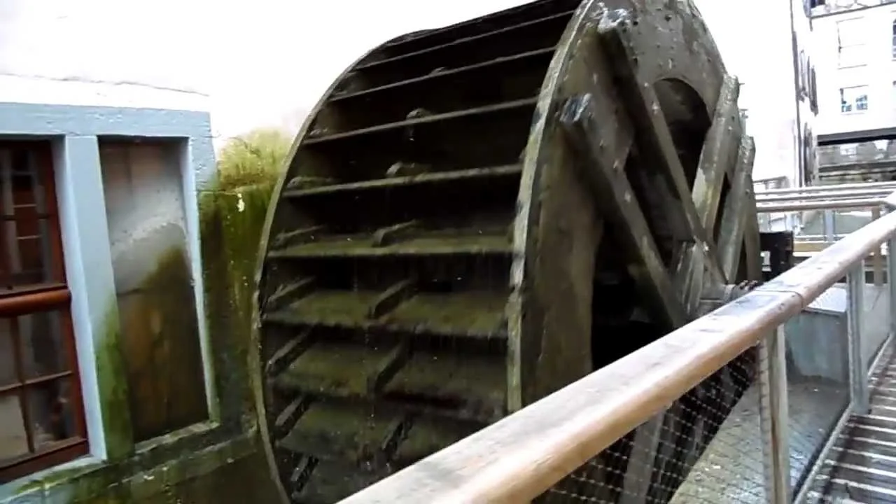 The huge water wheel which powers the paper mill at the Museum