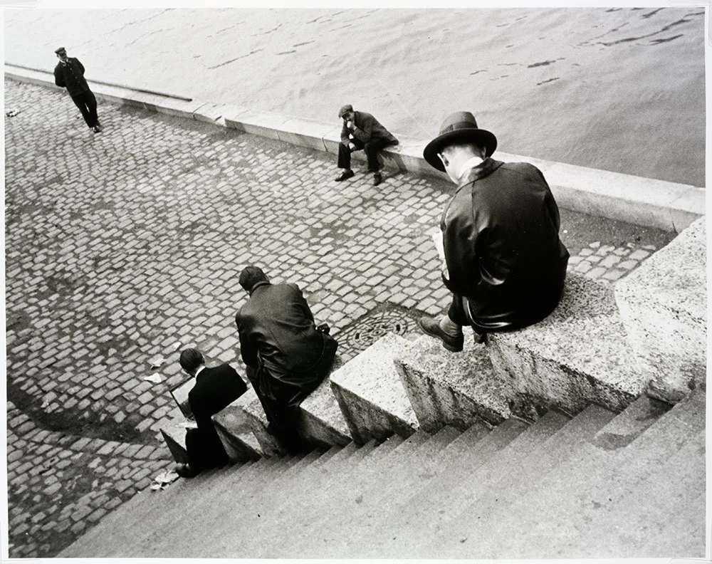 Ilse Bing, 'Three men on steps by the Seine' , (Image courtesy of the Victoria and Albert Museum)