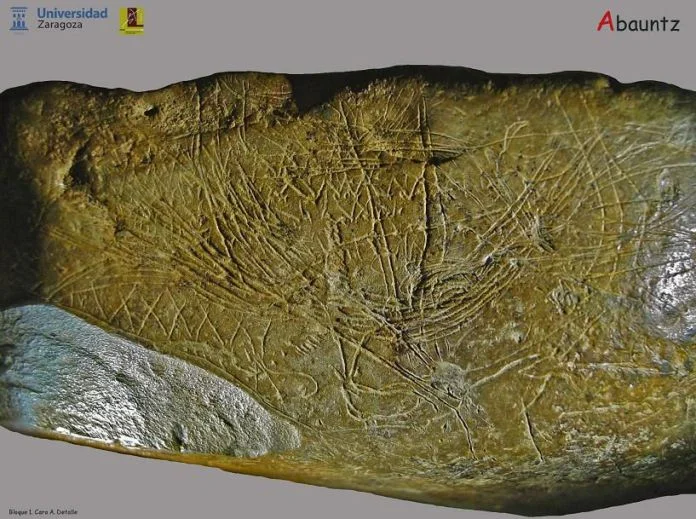 Image of the rock found in Abauntz cave with a map etched on it
