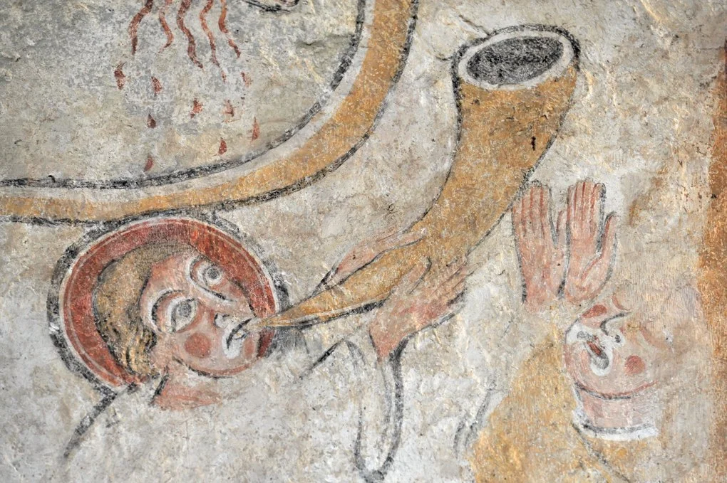Detail of a 12th century fresco, with the Angel sounding the Trumpet