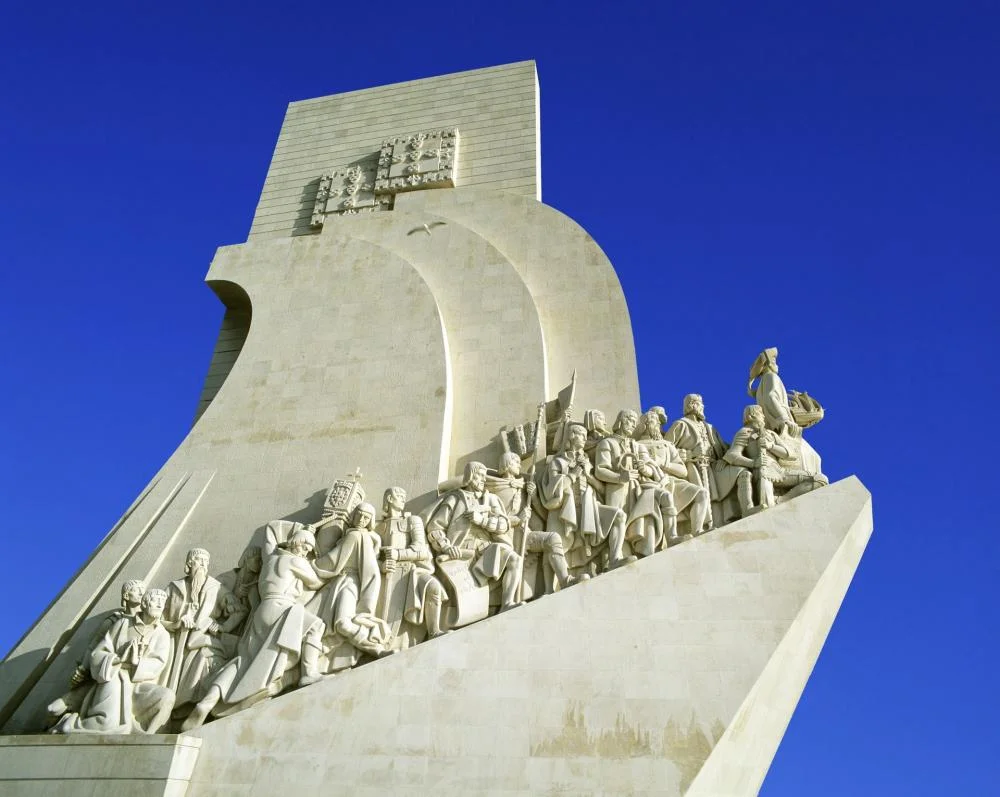 Monument of the Discoveries or Padrão dos Descobrimentos , seen on the banks of the Tagus River from the west.