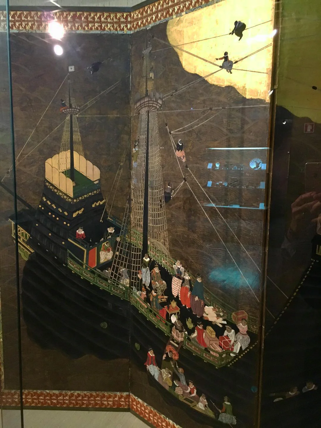 Detail of Portuguese ship. Namban screen. Attributed to Kano Domi, Japan, 1593-1602, Monoyama Period, tempera on paper, gold leaf, silk, lacquer, metal. Museu de Arte Antiga, Lisbon. ((Photograph J. Cook)