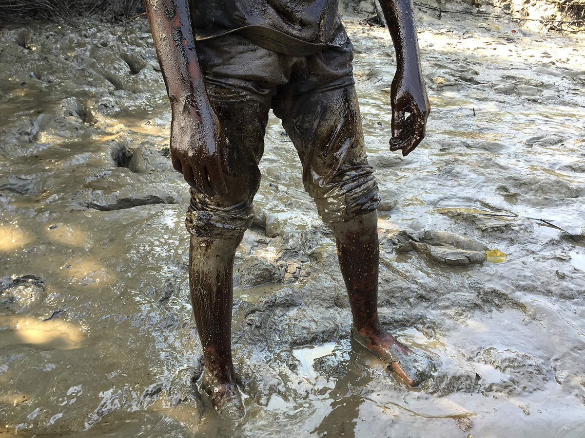 Children covered in oil