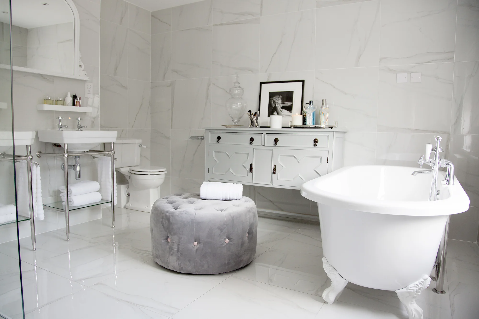 Sleek marble mixed in with a vintage sideboard