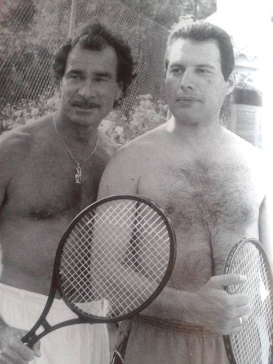 Tony Pike and Freddie Mercury on the tennis court at Pikes