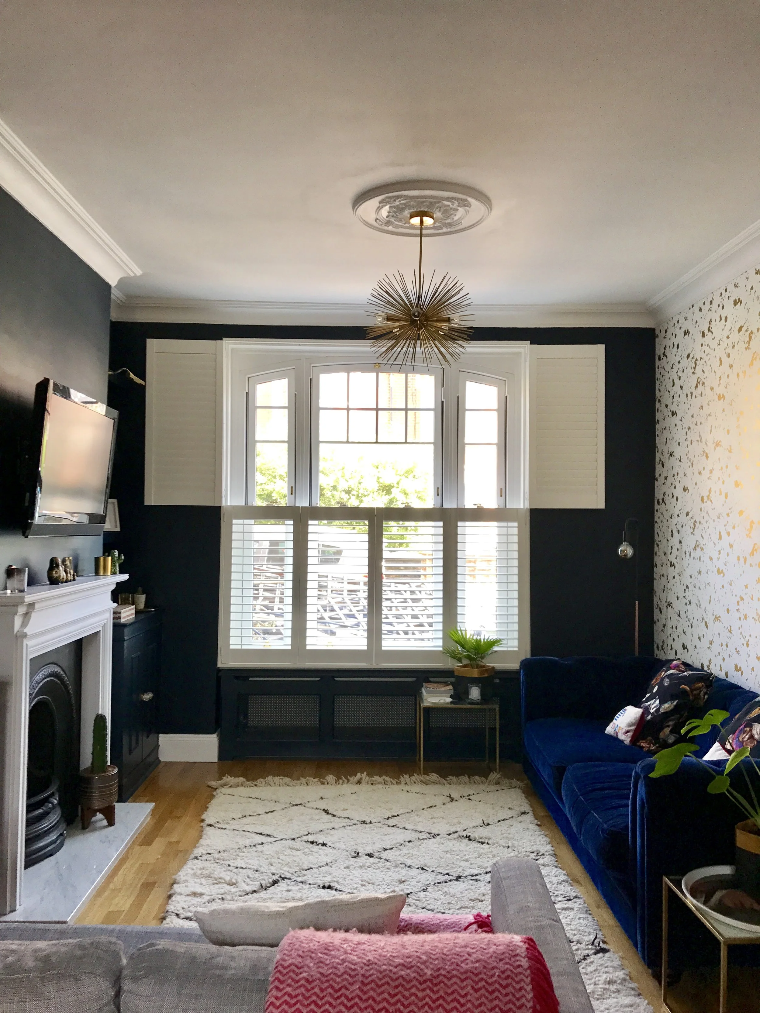 Sputnik pendants from Ebay, Navy blue velvet sofa from Sofa.com, cushions House of Hackney, Beni Ourain brought back from Morocco, Cactus and planter from West Elm