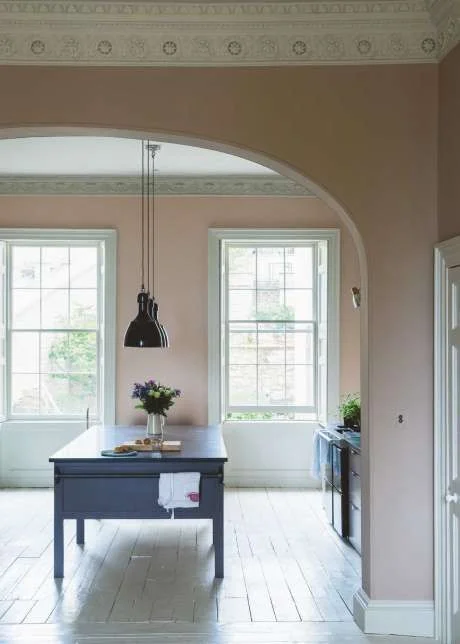 Walls painted in Farrow and Ball's Dead Salmon - Image via Solid Wood Kitchens