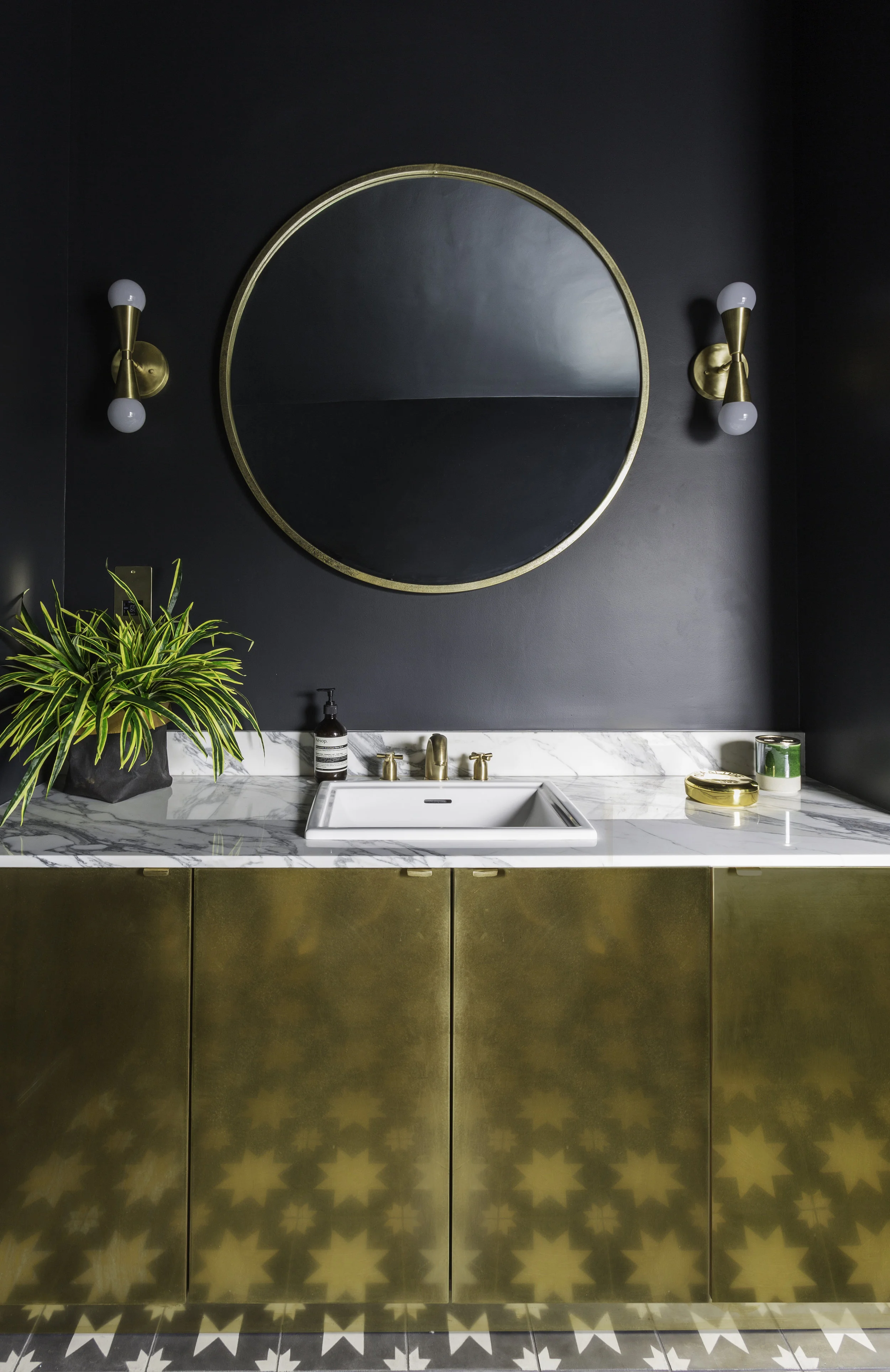 Glorious Custom Fronts brass cabinet, Victoria + Albert Baths Pembroke sink and Perrin & Rowe Crosshead taps in Satin Brass, Bert & May Pradena tiles Photo: Kasia Fizser