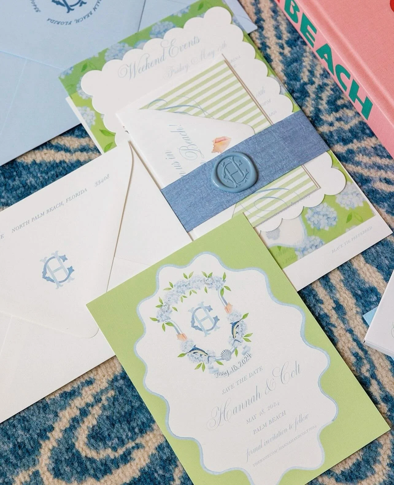 Happy Anniversary to Hannah &amp; Colt! Their fun, coastal aesthetic was the perfect touch for a Palm Beach wedding. The Custom Crest was featured on the Save the Date, Matchboxes and Stir Sticks while the Monogram was used on Cups, Napkins, Hats and