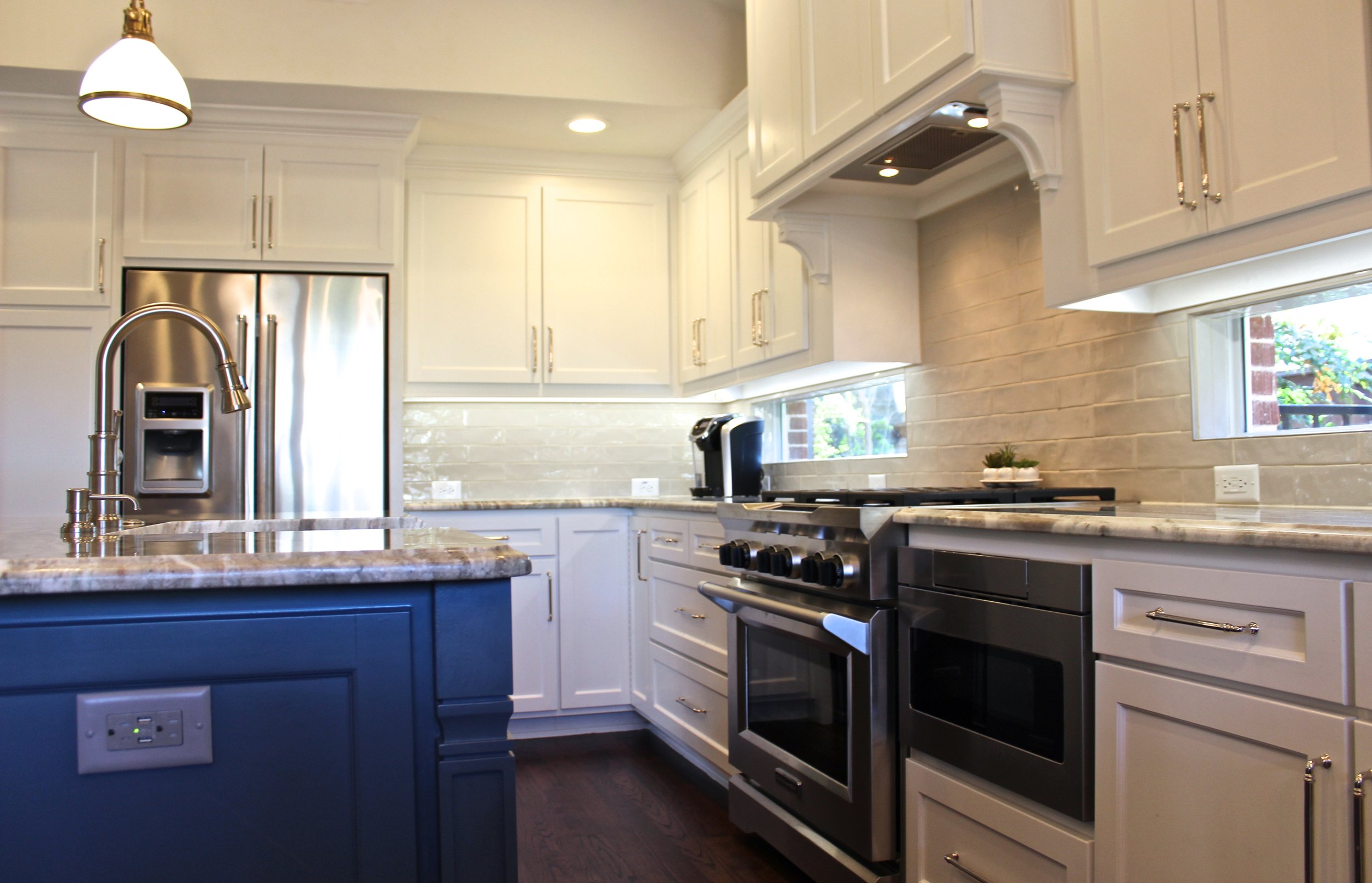 After: Light and bright with state-of-the-art stainless steel KitchenAid appliances 