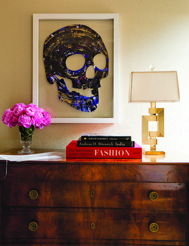Modern brass lamp displayed on an antique chest of drawers. I love the juxtaposition of styling with old and new pieces. 