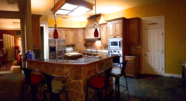 Before: Awkward angles made the space feel disjointed, and disconnected the chef from her guests in the adjacent living and dining rooms. 
