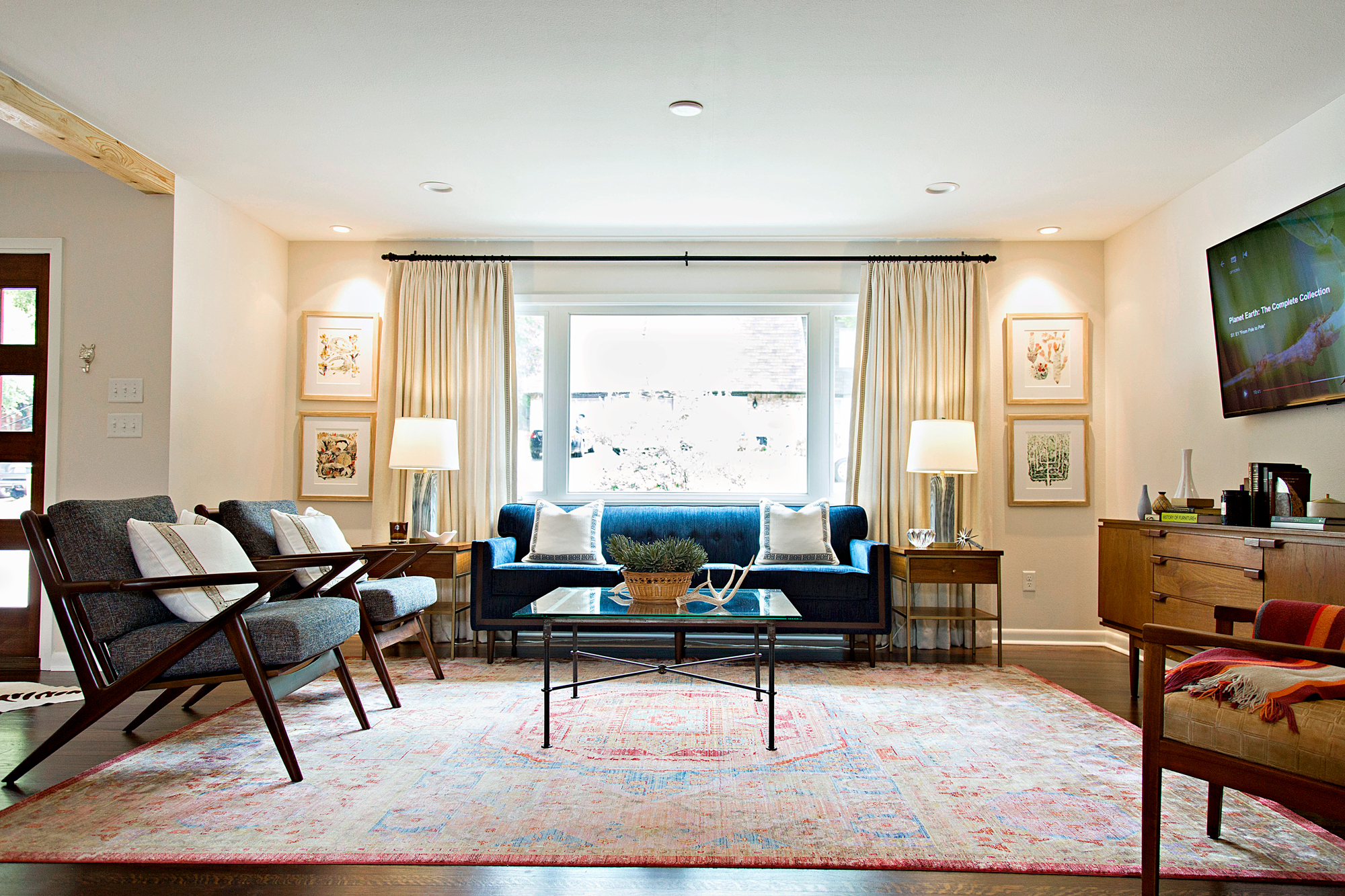 My living room: I combined new pieces with antique Mid-Century Modern pieces for a curated and blended aesthetic. There is nothing that breaks my heart like a room that feels like a catalogue. 
