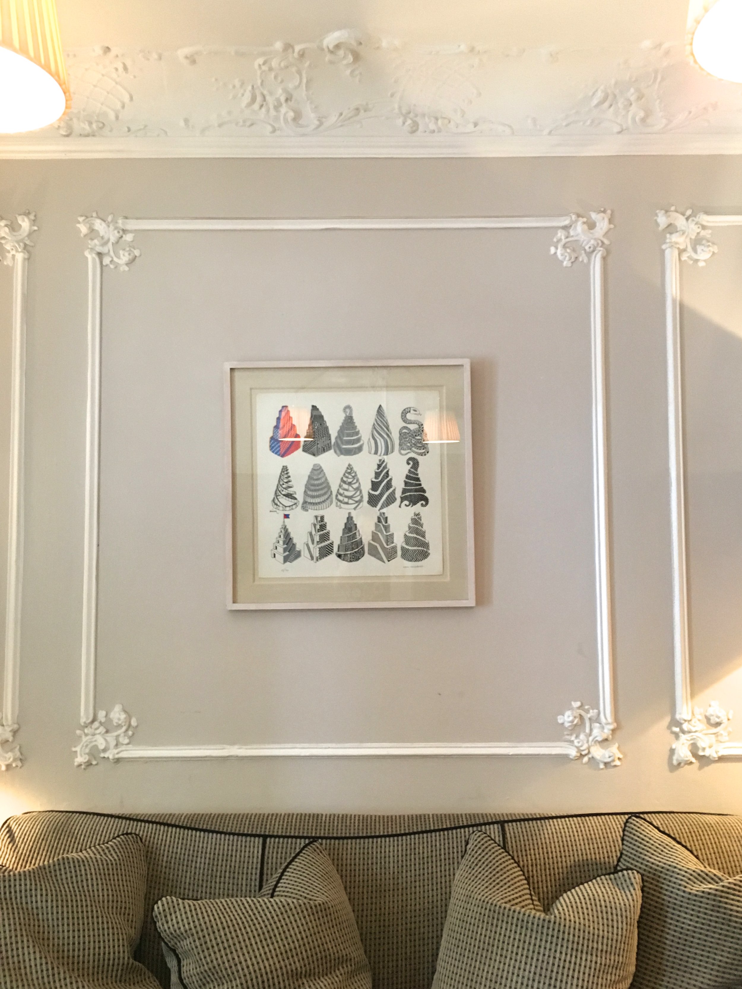 The parlor adorned with plaster of paris picture moulding. 