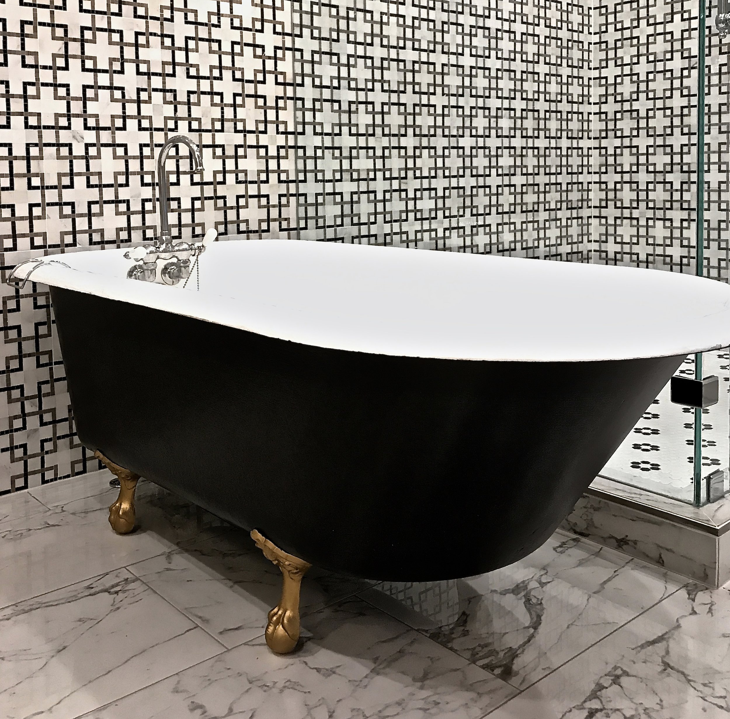 Refinished claw foot bath tub- an updated original. 