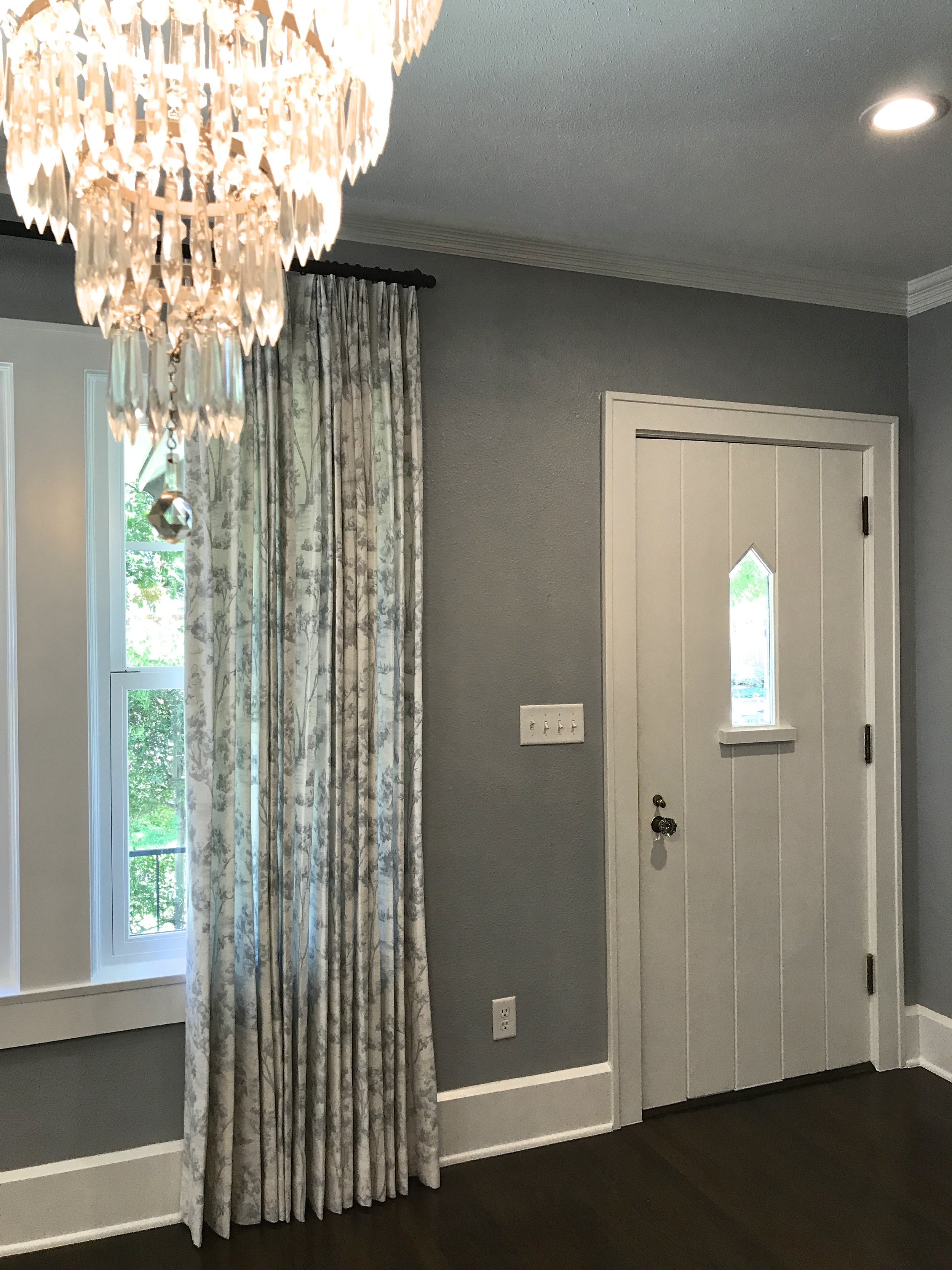 We kept the original front door and hardware. 