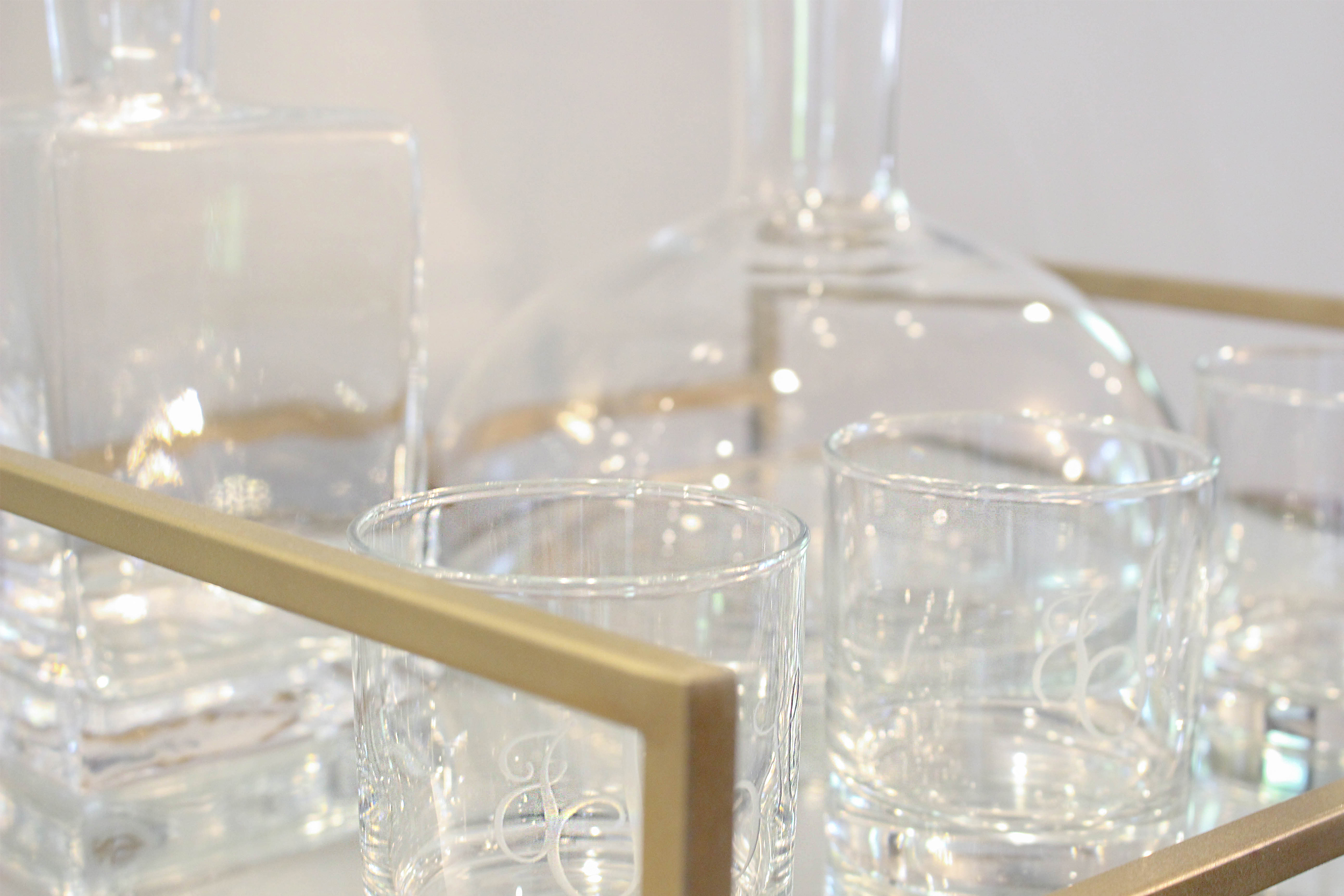 Brass bar tray detail. We used the client's own decanters and monogrammed highball glasses. 