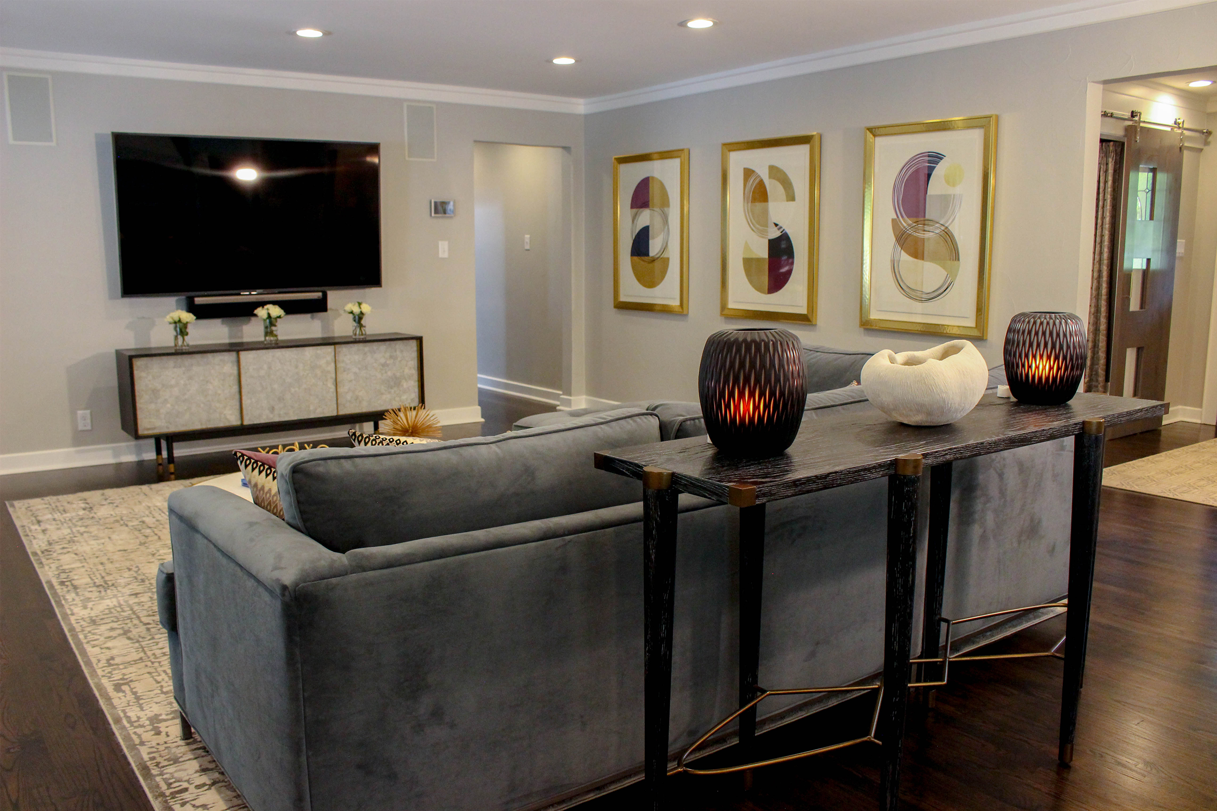 We customized the colors in this series of art to accent the eggplant upholstery. 